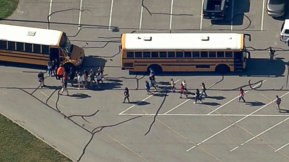 PHOTO: Students are loaded onto school buses at Noblesville West Middle School in Noblesville, Ind., after reports of a shooting, May 25, 2018.