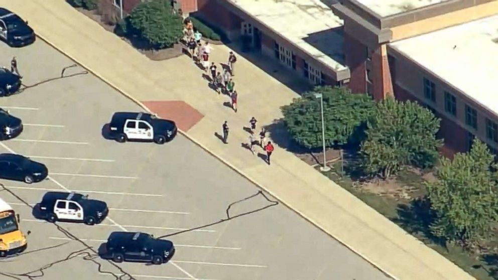 PHOTO: People stream out of Noblesville West Middle School in Noblesville, Ind., after reports of a shooting, May 25, 2018.