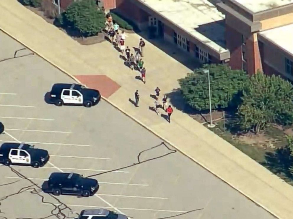 PHOTO: People stream out of Noblesville West Middle School in Noblesville, Ind., after reports of a shooting, May 25, 2018.
