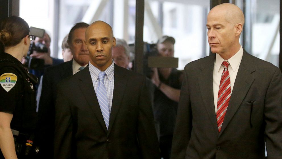 PHOTO: Former Minneapolis police officer Mohamed Noor walks through the skyway with his attorney Thomas Plunkett, right, on the way to court for the verdict Tuesday, April 30, 2019, in Minneapolis, Minn.