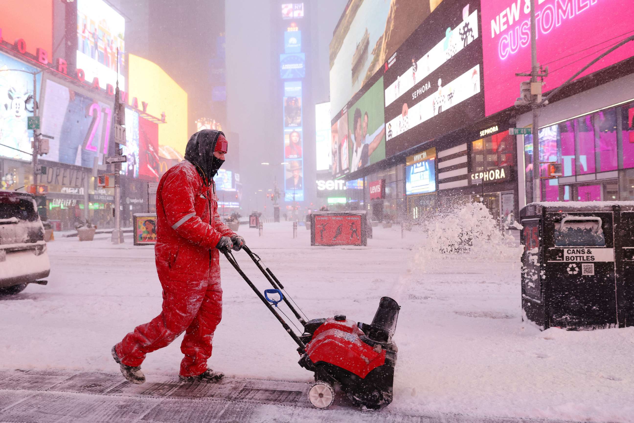 PHOTO: A worker clears snow in Times Square during a Nor'easter storm in New York, Jan. 29, 2022. 