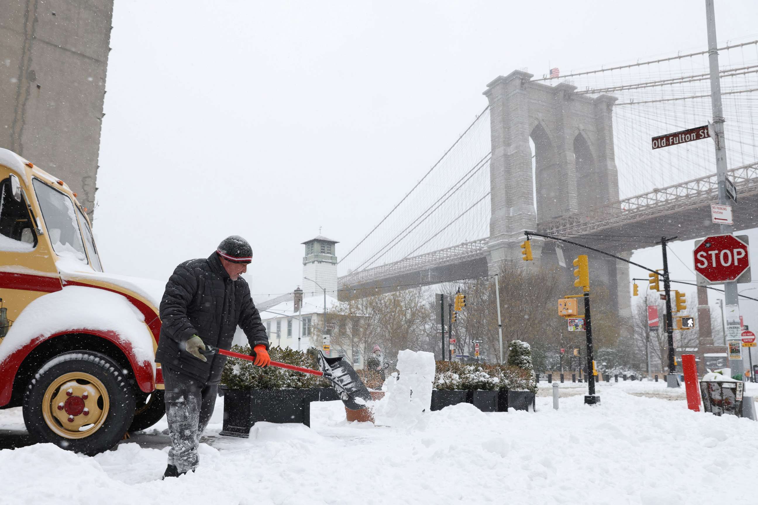 PHOTO: A person shovels snow during a Nor'easter storm in Brooklyn, N.Y., Jan. 29, 2022.