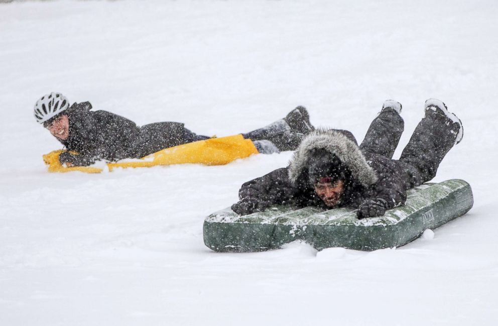 PHOTO: People sled on the Boston Common as Winter Storm Skylar bears down, March 13, 2018, in Boston.