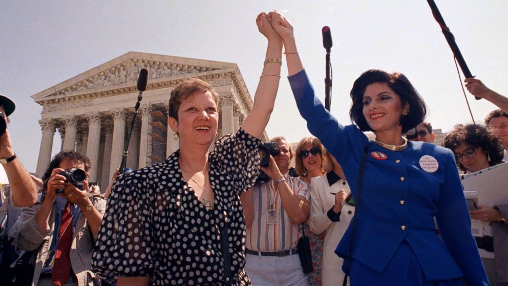 PHOTO: In this Wednesday, April 26, 1989 file photo, Norma McCorvey, Jane Roe in the 1973 court case, left, and her attorney Gloria Allred hold hands as they leave the Supreme Court building in Washington.