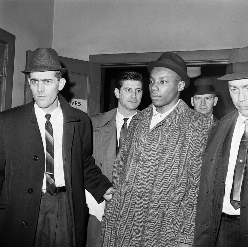 PHOTO: Police escort Norman Butler into a jail in New York.