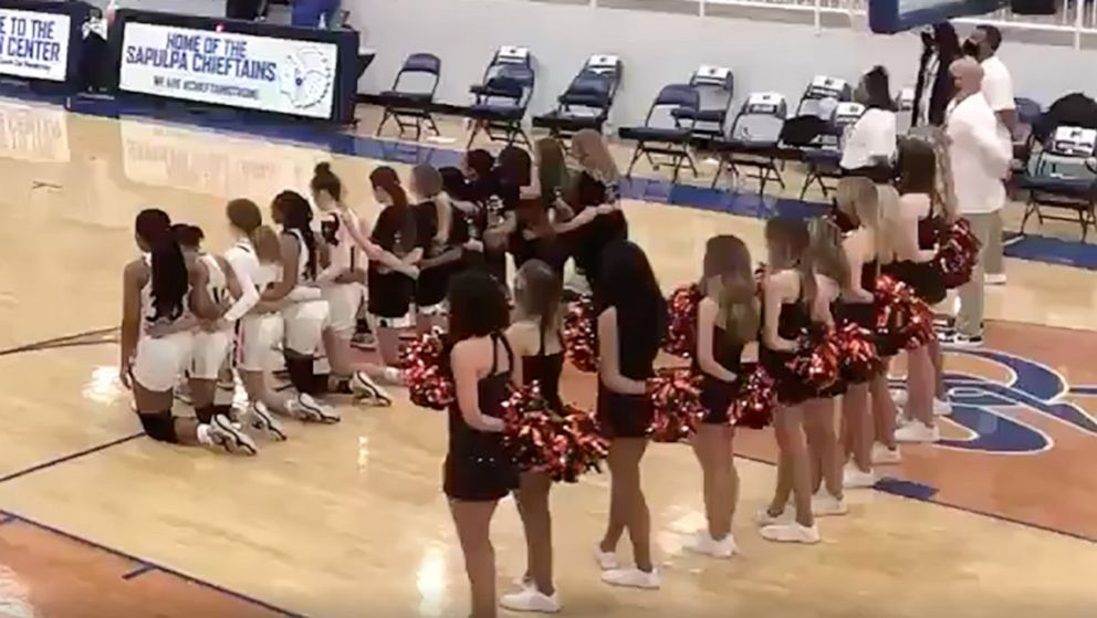 High school sports announcer was caught cursing the female basketball team for racial slander while players kneeled during the anthem