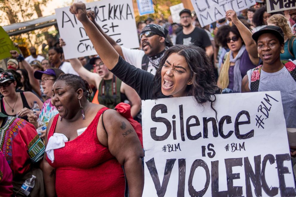 PHOTO: Demonstrators march through the streets following a rally at Marshall Park on Sept. 24, 2016 in Charlotte, N.C.