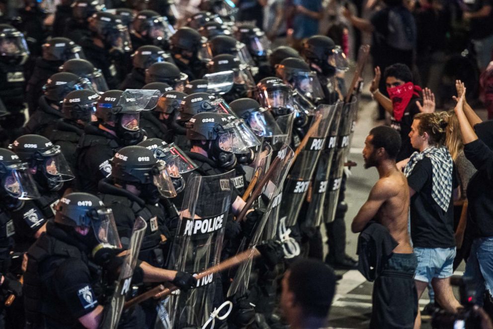 PHOTO: Police officers in riot gear approach demonstrators on Sept. 21, 2016 in downtown Charlotte, N.C.