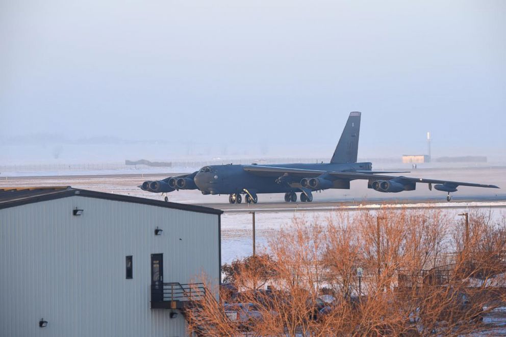 PHOTO: A U.S. Air Force B-52 bomber sits on the runway at Minot Air Force Base in North Dakota during a cold snap in January 2019.