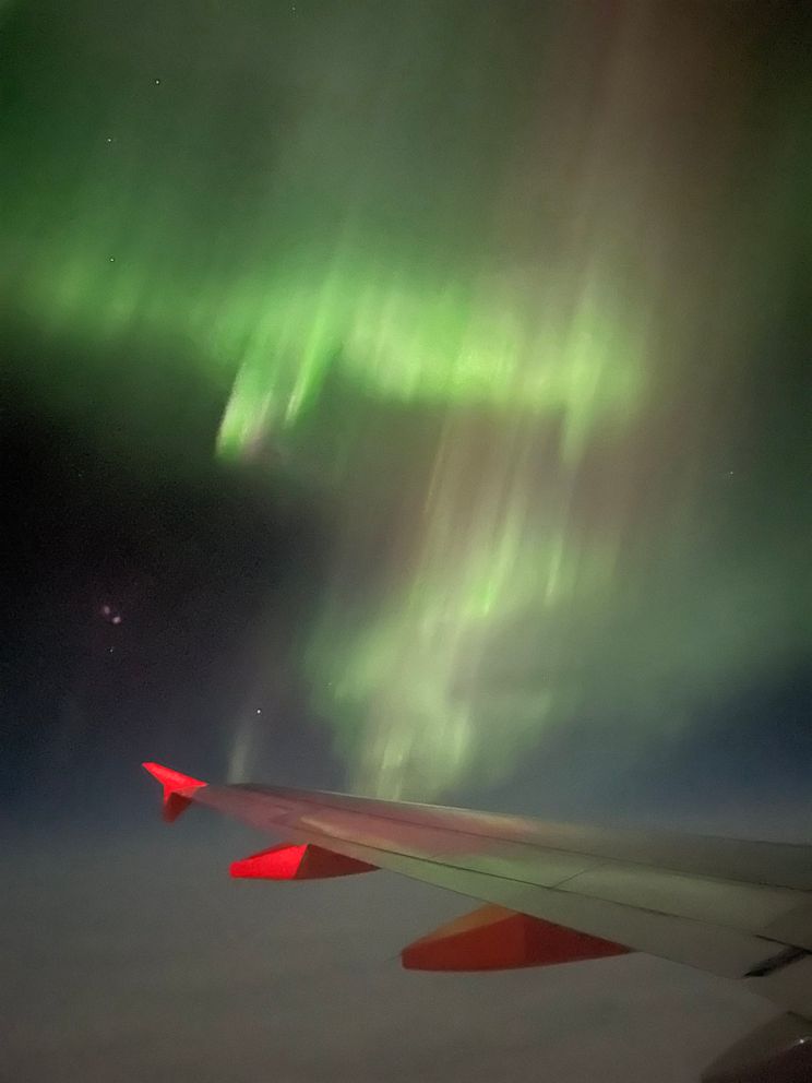 PHOTO: in this image posted to social media, the northern lights can be seen from a plane flying from Reykjavik, Iceland, to Manchester, England, on Feb. 27, 2023.