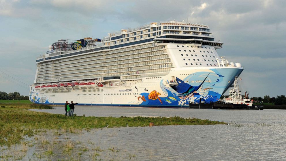 The new cruise vessel Norwegian Escape built by the Meyer Shipyard embarks on its delivery voyage from Papenburg, Germany, Sept. 18, 2015.