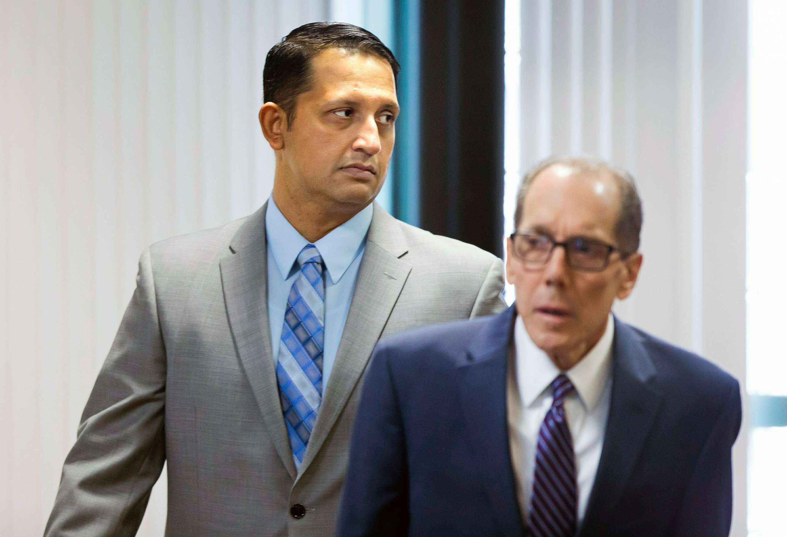 PHOTO: Nouman Raja enters the courtroom with defense attorney Richard Lubin for closing arguments in his trial, March 6, 2019, in West Palm Beach, Fla.