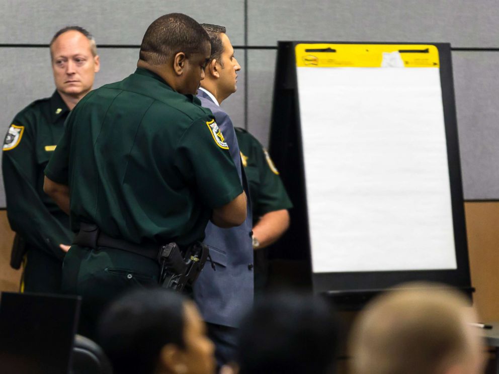 PHOTO: Nouman Raja is led from the courtroom after being taken into custody after being found guilty, March 7, 2019, in West Palm Beach, Fla.