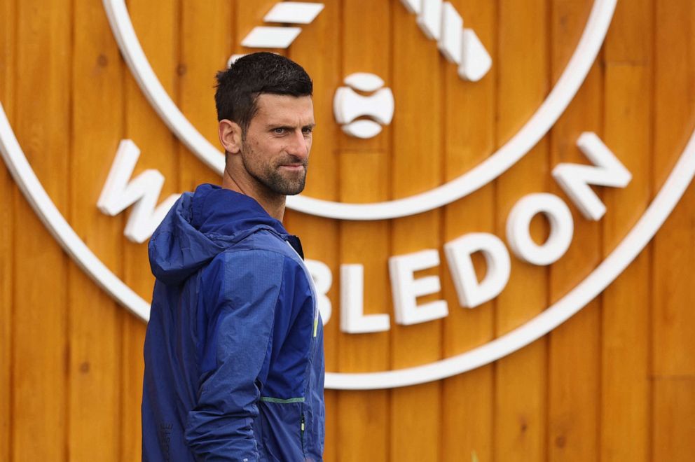 PHOTO: Serbia's Novak Djokovic heads to practice at the All England Lawn Tennis and Croquet Club, London, July 7, 2022.