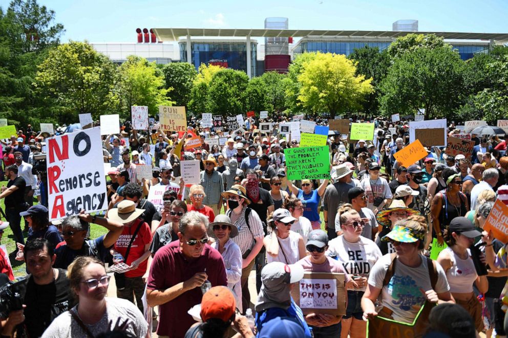 PHOTO: People protest outside the National Rifle Association Annual Meeting at the George R. Brown Convention Center, on May 27, 2022, in Houston.