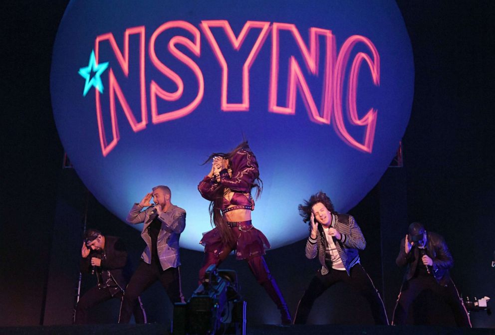 PHOTO: Ariana Grande performs with members of NSYNC Chris Kirkpatrick, Lance Bass, JC Chasez and Joey Fatone on Coachella Stage during the 2019 Coachella Valley Music And Arts Festival on April 14, 2019, in Indio, Calif.
