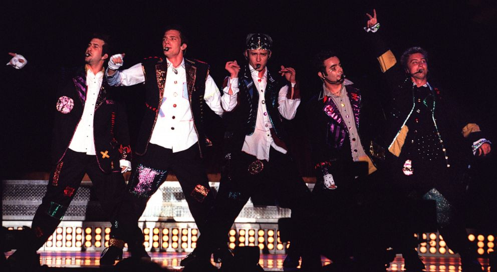 PHOTO: NSYNC members perform during a concert at the Rose Bowl in Los Angeles, June 9, 2000.