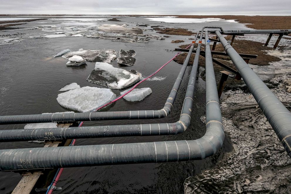  FILE - Pipelines extend across the landscape outside Nuiqsut, AK, May 29, 2019.
