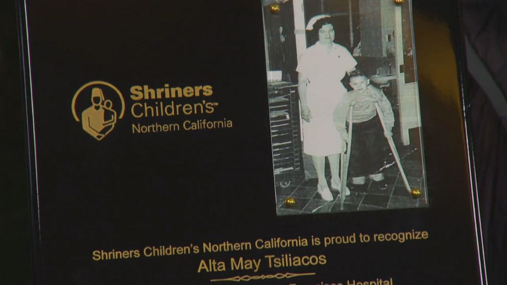 PHOTO: Bryan Tsiliacos' grandmother, a retired Shriners Children's Hospital Nurse, is honored with a plaque.