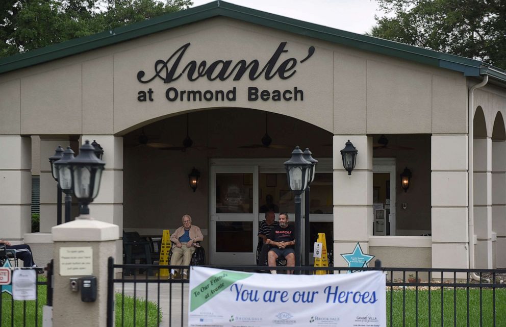PHOTO: Residents are seen at the Avante at Ormond Beach nursing home, one of the 324 long term care facilities in Florida with known COVID-19 cases, on April 25, 2020 in Ormond Beach, Florida.