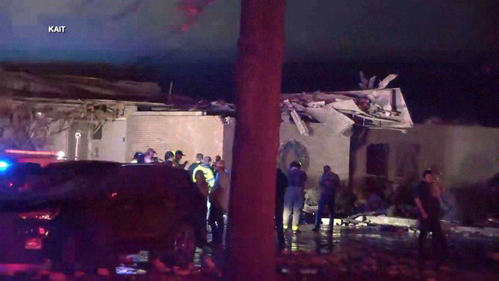 PHOTO: First responders at the scene of a nursing home damaged by severe weather in Monette, Arkansas, where several people were trapped inside, Dec. 11, 2021.