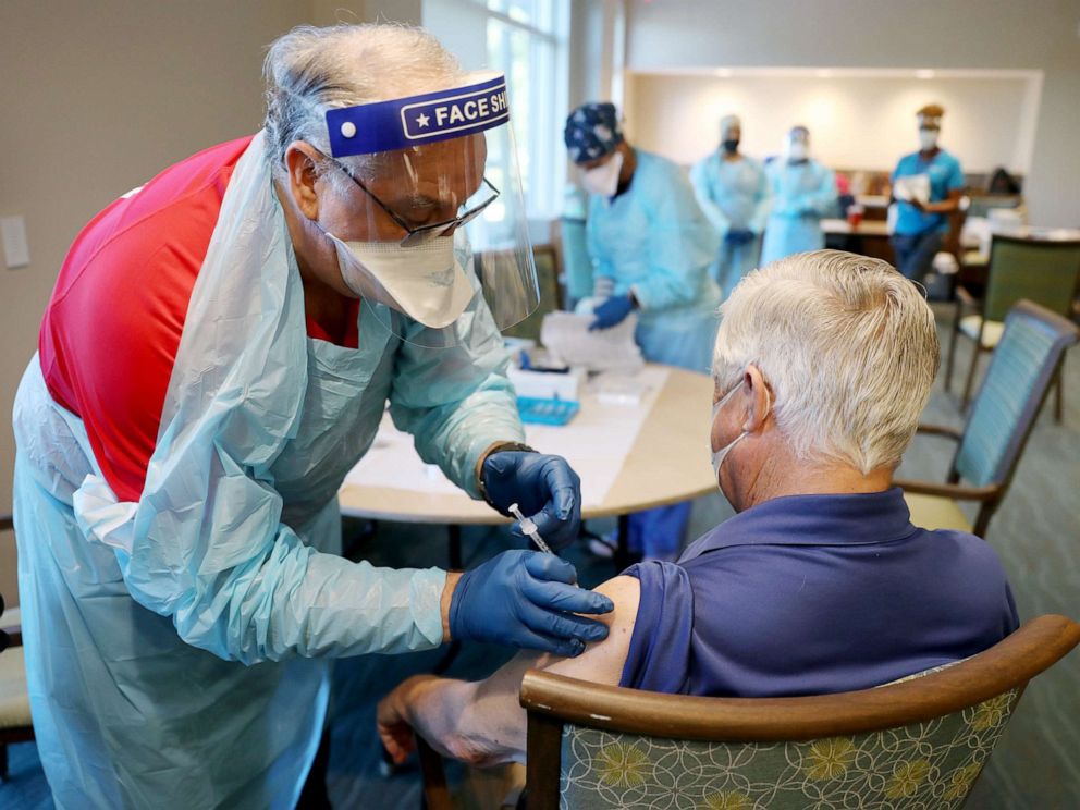 PHOTO: A healthcare worker administers a dose of COVID-19 vaccine in Pompano Beach, FLa.  Jan. 6, 2021.