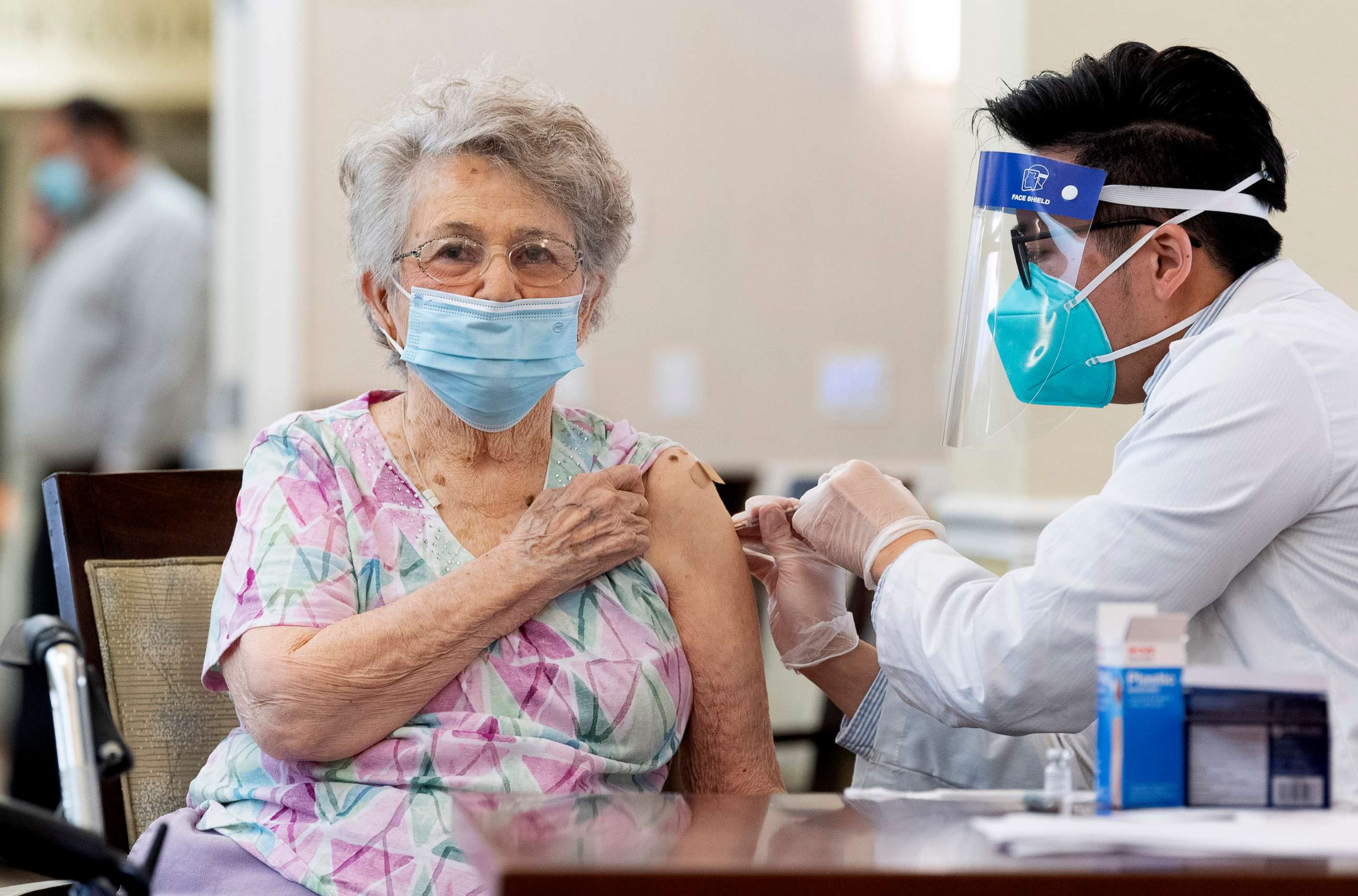 PHOTO: A CVS pharmacist gives the Pfizer/BioNTech COVID-19 vaccine to a resident at the Emerald Court senior living community in Anaheim, Calif., Jan. 8, 2021.