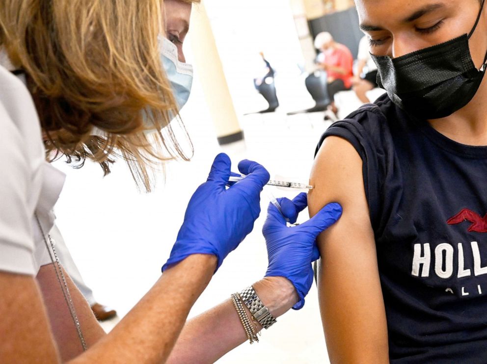 PHOTO: Jayson Molina Majano, 17, receives a Covid-19 vaccine at Freeport High School on July 15, 2021 in Freeport, N.Y.
