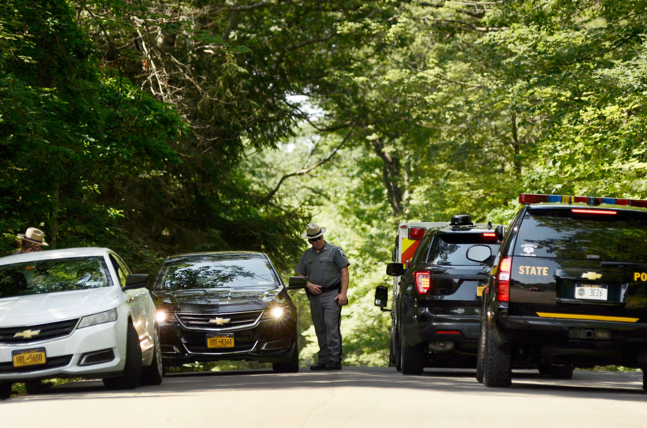 PHOTO: New York State Police block the entrance of Welch Road in Corning, N.Y., July 2, 2018, as they investigate the scene of a shooting near SUNY Corning Community College.