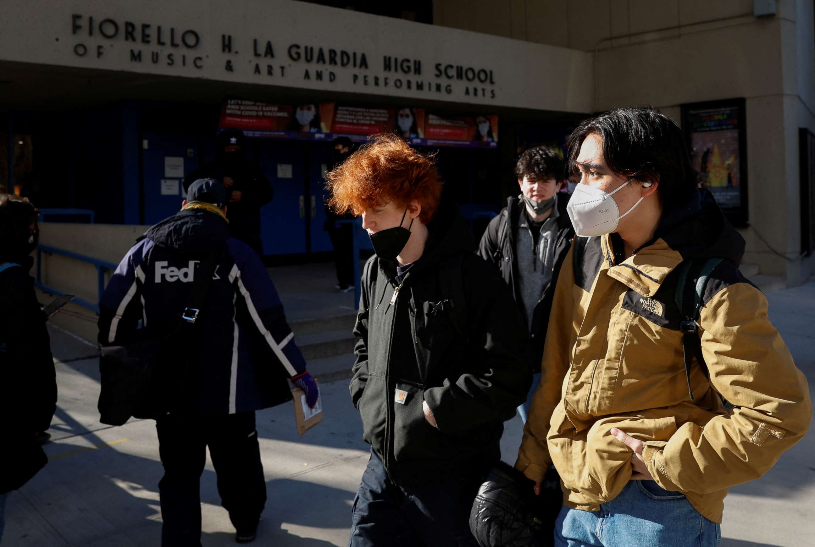 PHOTO: High school students leave the Fiorello H. La Guardia High School as some students staged a walkout to urge officials to offer remote learning options amid the spread of the coronavirus disease in Manhattan in New York City, Jan. 11, 2022.