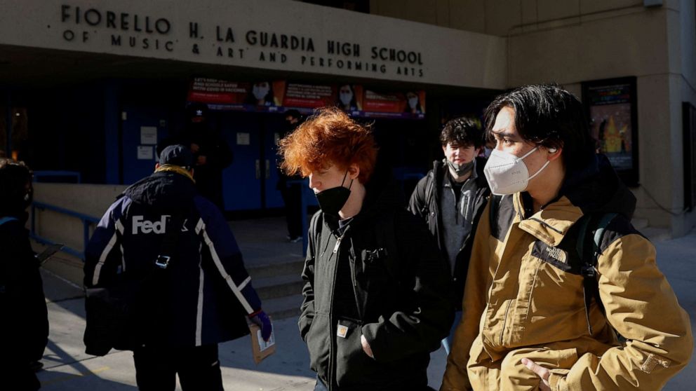 PHOTO: High school students leave the Fiorello H. La Guardia High School as some students staged a walkout to urge officials to offer remote learning options amid the spread of the coronavirus disease in Manhattan in New York City, Jan. 11, 2022.