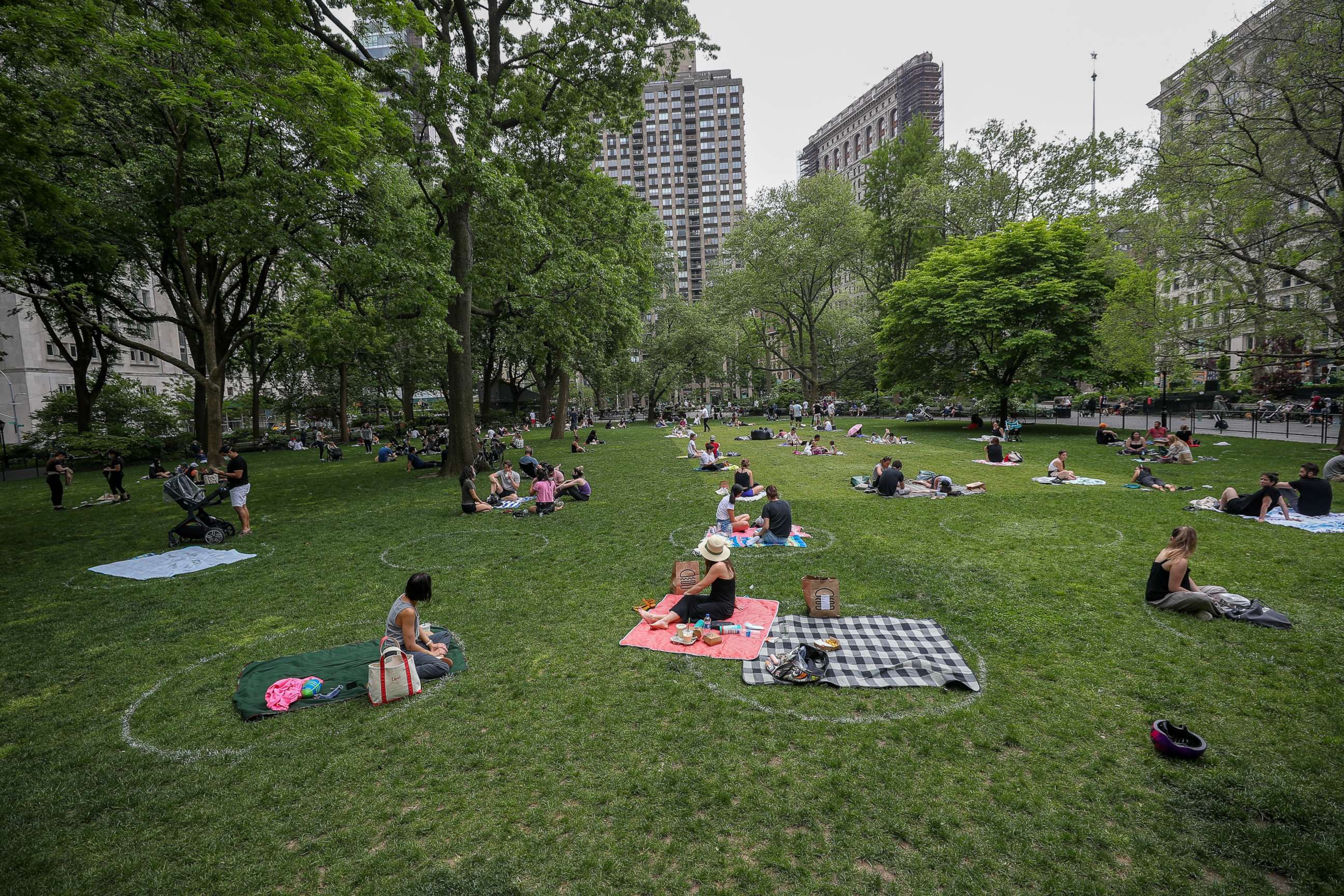 PHOTO: People are seen practicing social distancing in white circles at the Madison Square Park during Covid-19 pandemic in Manhattan, New York City, United States on May 22, 2020.