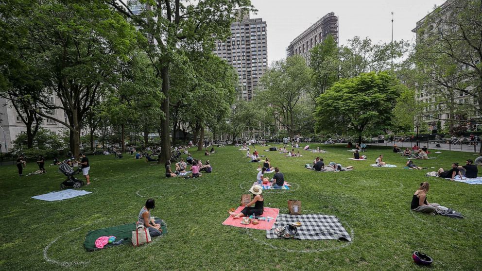 PHOTO: People are seen practicing social distancing in white circles at the Madison Square Park during Covid-19 pandemic in Manhattan, New York City, United States on May 22, 2020.