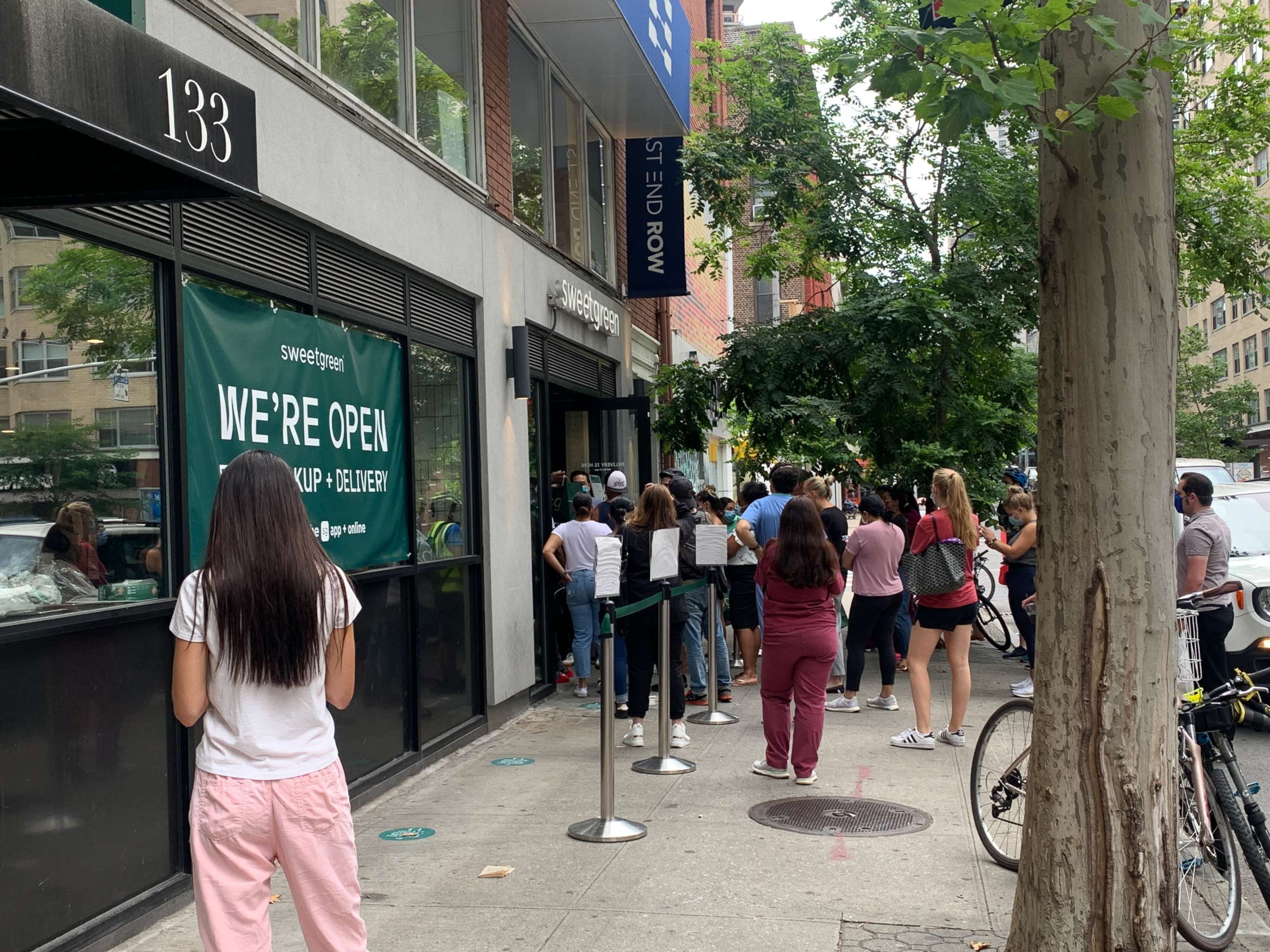PHOTO: Customers queued up at Sweet Green restaurant on July 8, 2020.