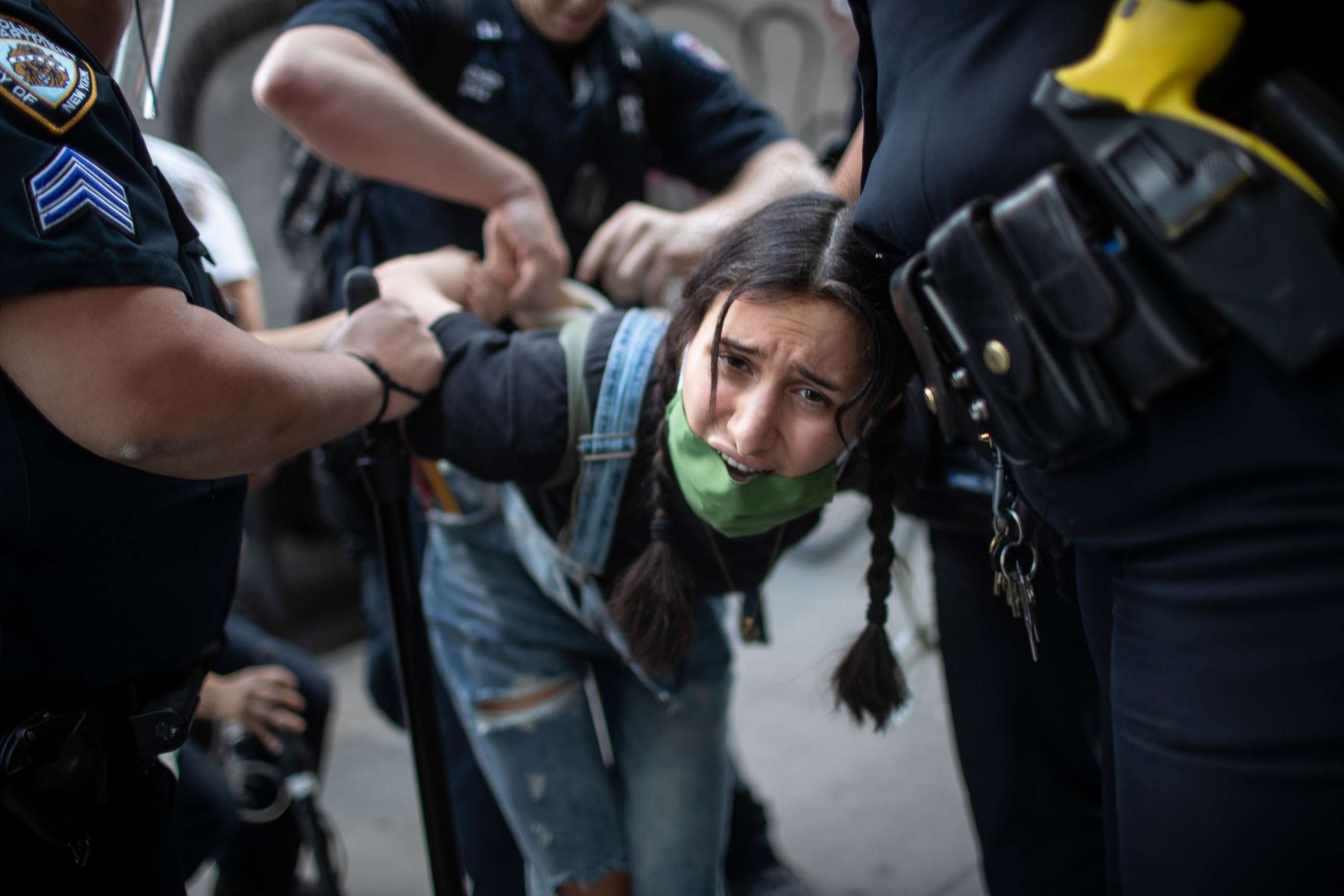 PHOTO: Police arrest a protester during a solidarity rally for George Floyd, Saturday, May 30, 2020, in New York. 