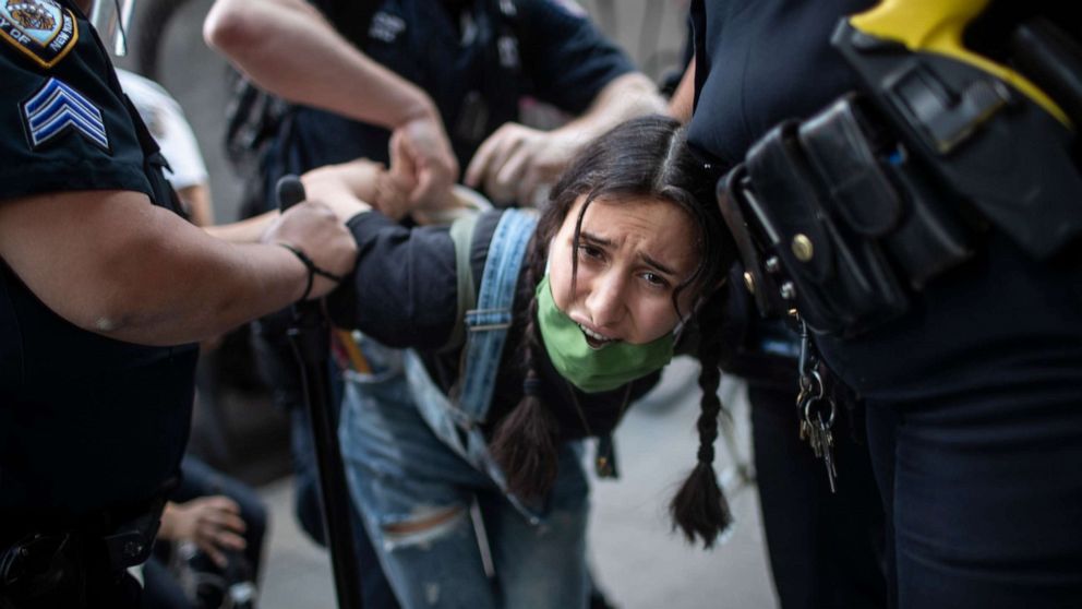 PHOTO: Police arrest a protester during a solidarity rally for George Floyd, Saturday, May 30, 2020, in New York. 