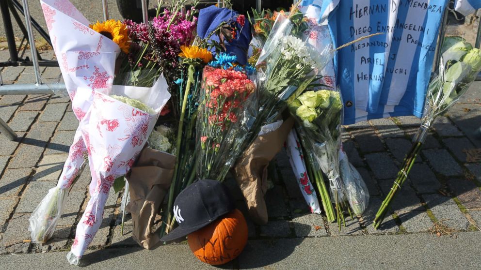 Manhattan bike path dotted with memorials, signs of resilience 2 days ...