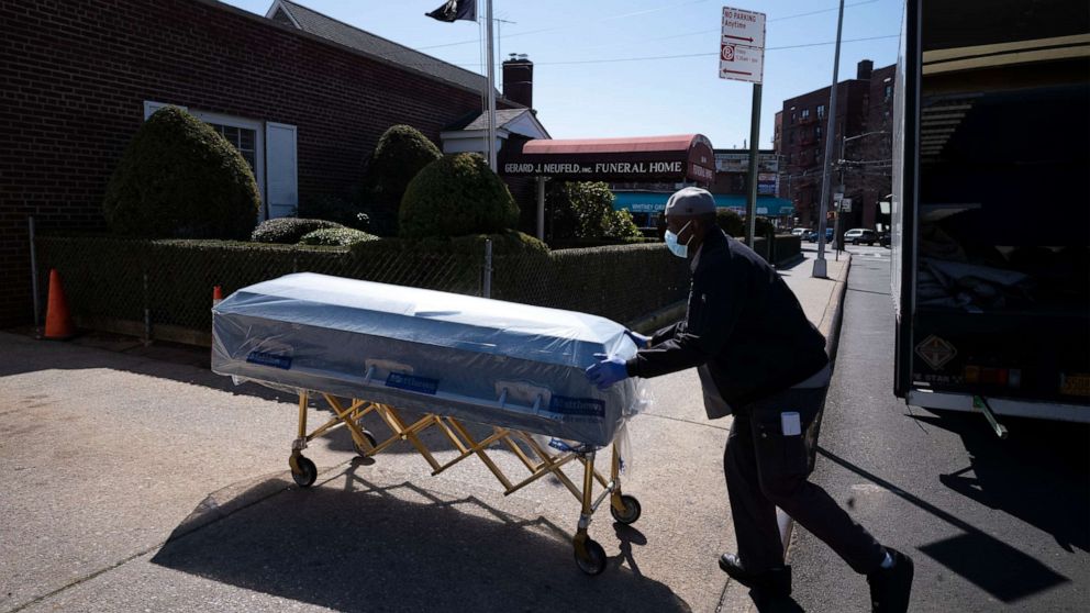 PHOTO: William Samuels delivers caskets to the Gerard J. Neufeld funeral home in the Queens borough of New York City on March 27, 2020, amid the coronavirus pandemic.