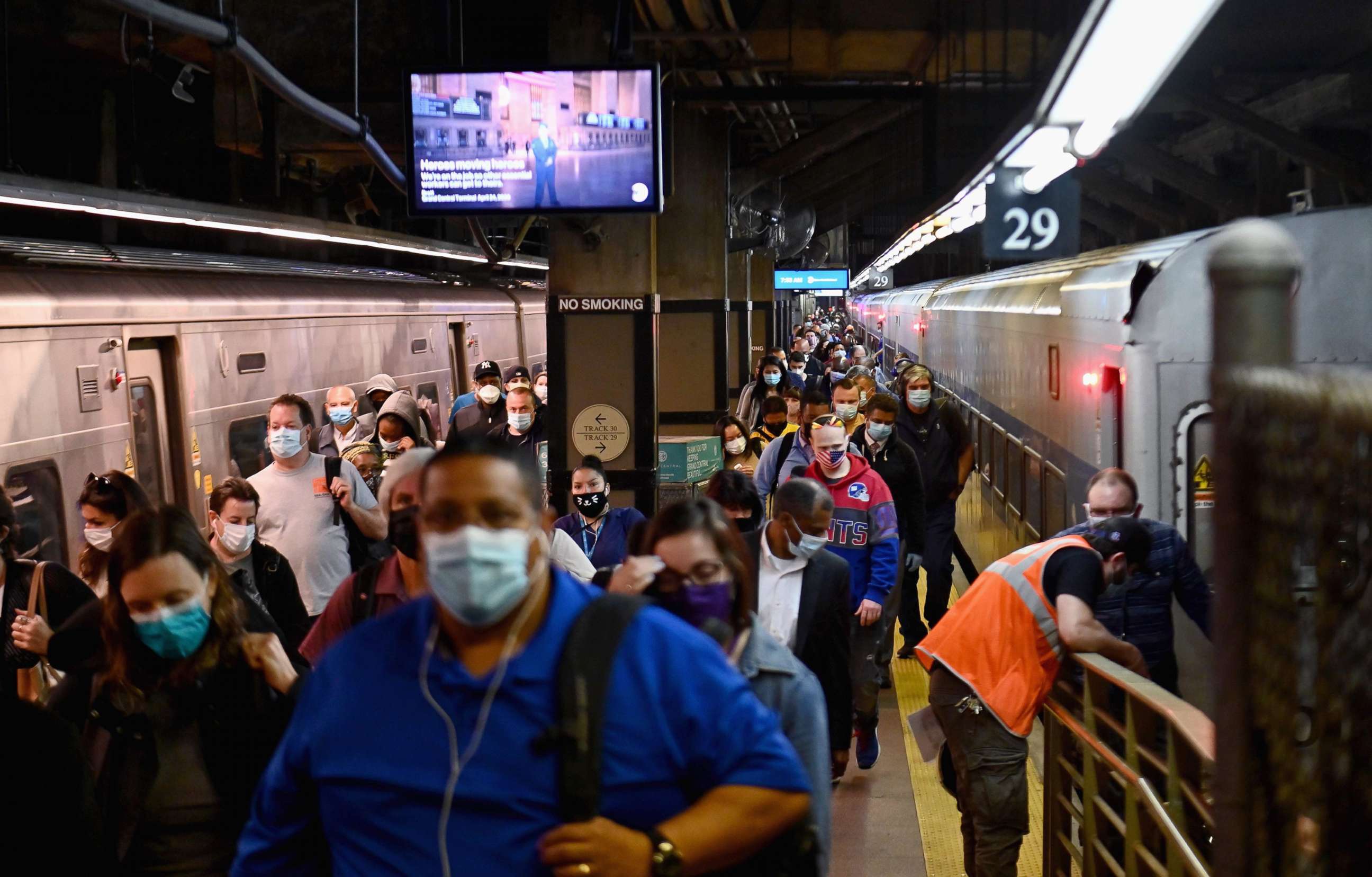 PHOTO: Commuters arrive at Grand Central Station on Metro-North trains during morning rush hour, June 8, 2020 in New York City, as the city enters "Phase 1" of a four-part reopening plan after spending more than two months under lockdown.