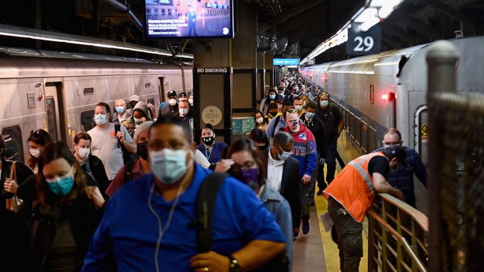 PHOTO: Commuters arrive at Grand Central Station on Metro-North trains during morning rush hour, June 8, 2020 in New York City, as the city enters "Phase 1" of a four-part reopening plan after spending more than two months under lockdown.