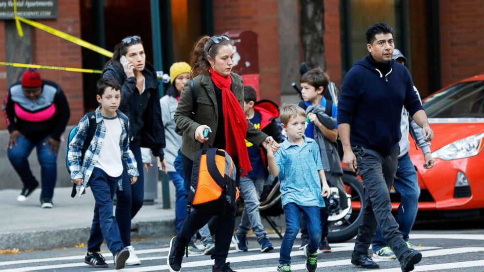 PHOTO: Parents pick up their children from P.S./I.S.-89 school after a truck struck people on a bike path in New York City, Oct. 31, 2017.