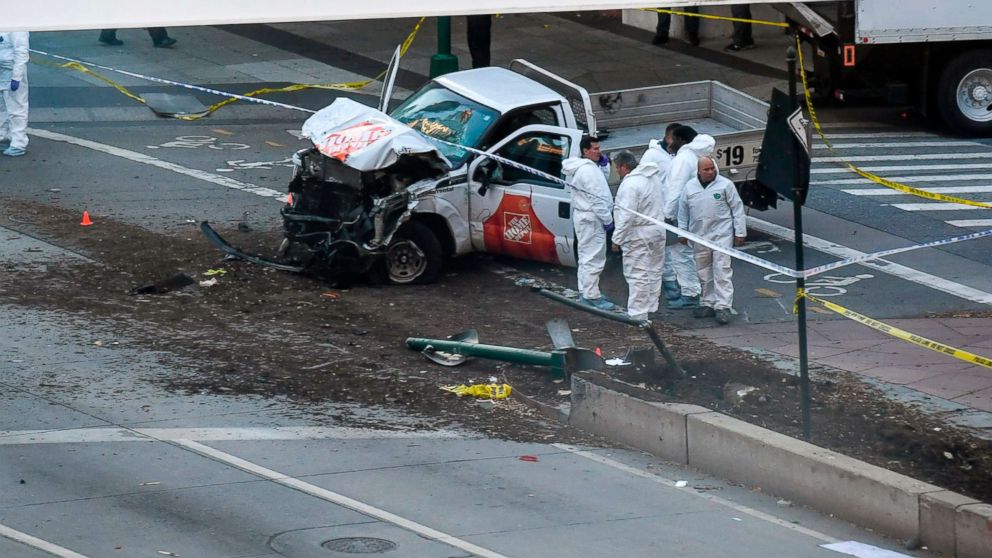 Investigators inspect a truck following an incident in New York City, Oct. 31, 2017. Several people were killed and numerous others injured in New York when a suspect plowed a vehicle into a bike and pedestrian path in Lower Manhattan.