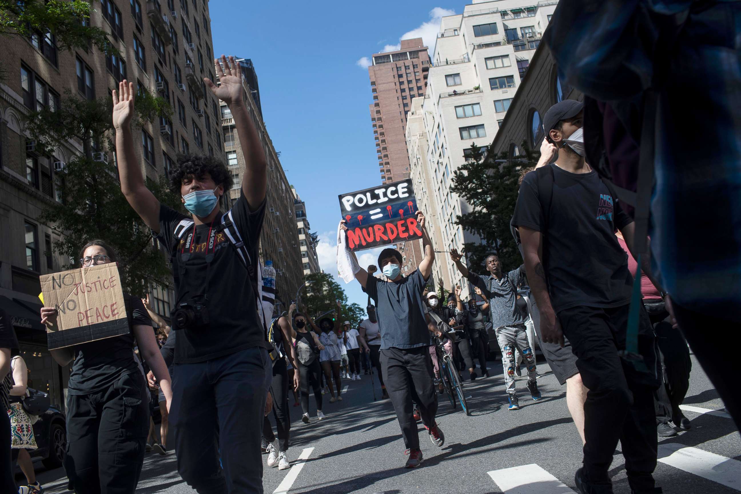 PHOTO: Protesters march during a solidarity rally for George Floyd, May 30, 2020, in New York.