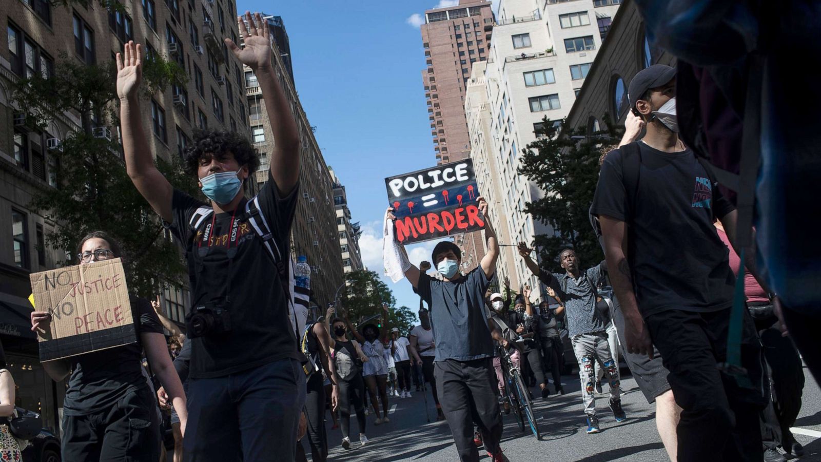 PHOTO: Protesters march during a solidarity rally for George Floyd, May 30, 2020, in New York.