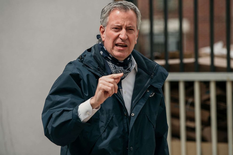 PHOTO: New York City Mayor Bill de Blasio speaks at a food pantry organized by The Campaign Against Hunger in the Brooklyn borough of New York, April 14, 2020.