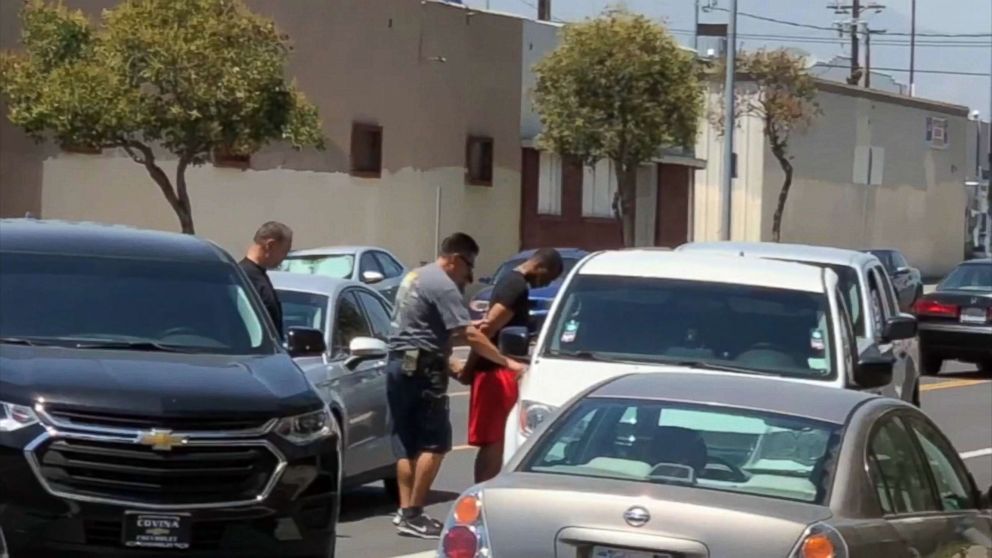 PHOTO: Murder suspect Danuel Drayton, 27, is arrested in the North Hollywood neighborhood of Los Angeles, July 23, 2018.