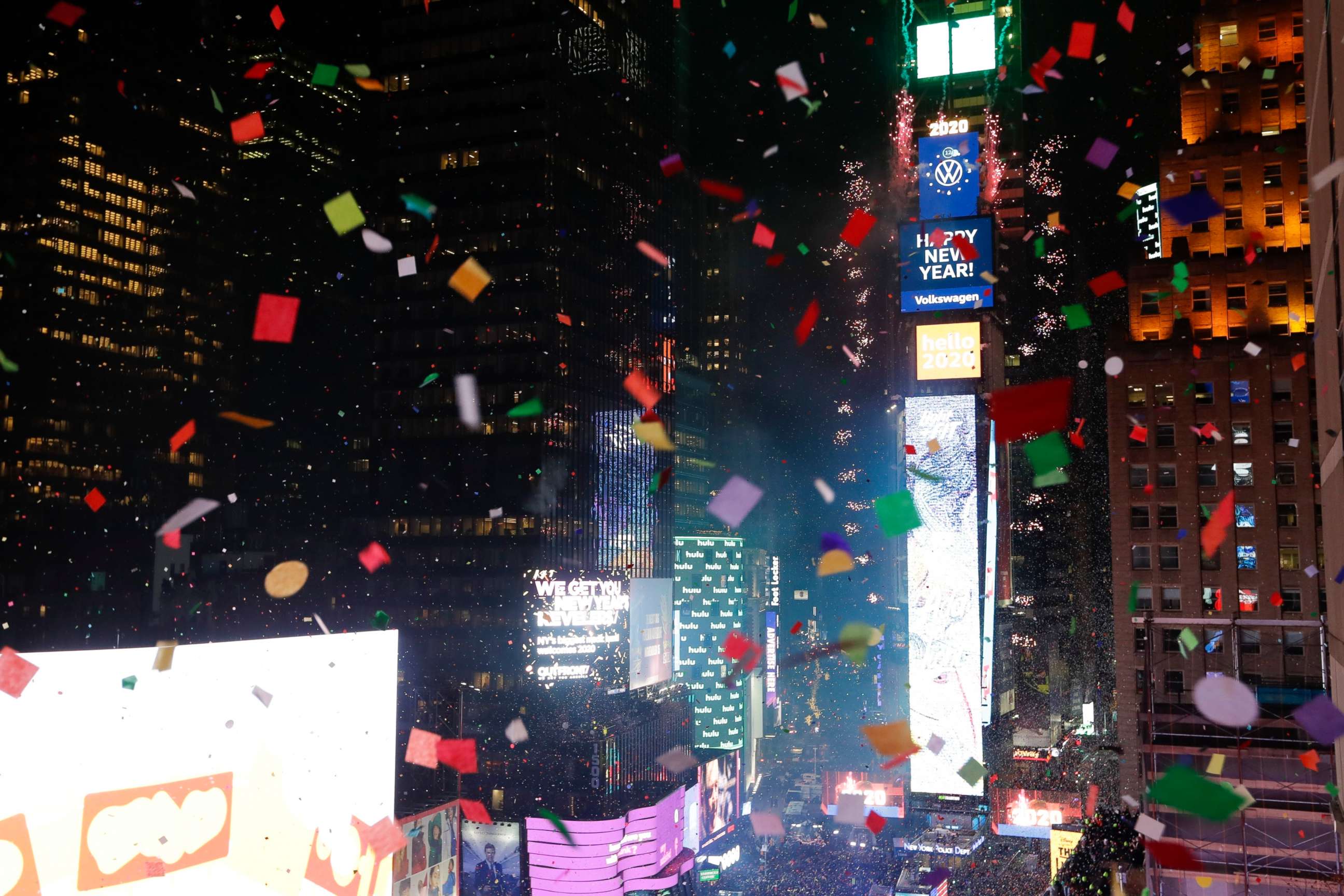 PHOTO: Confetti drops over the crowd as the clock strikes midnight during the New Year's celebration as seen from the New York Marriott Marquis in New York's Times Square, Wednesday, Jan. 1, 2020. 