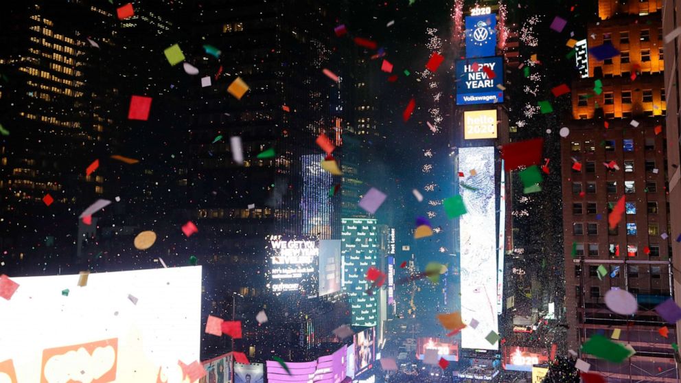 PHOTO: Confetti drops over the crowd as the clock strikes midnight during the New Year's celebration as seen from the New York Marriott Marquis in New York's Times Square, Wednesday, Jan. 1, 2020. 