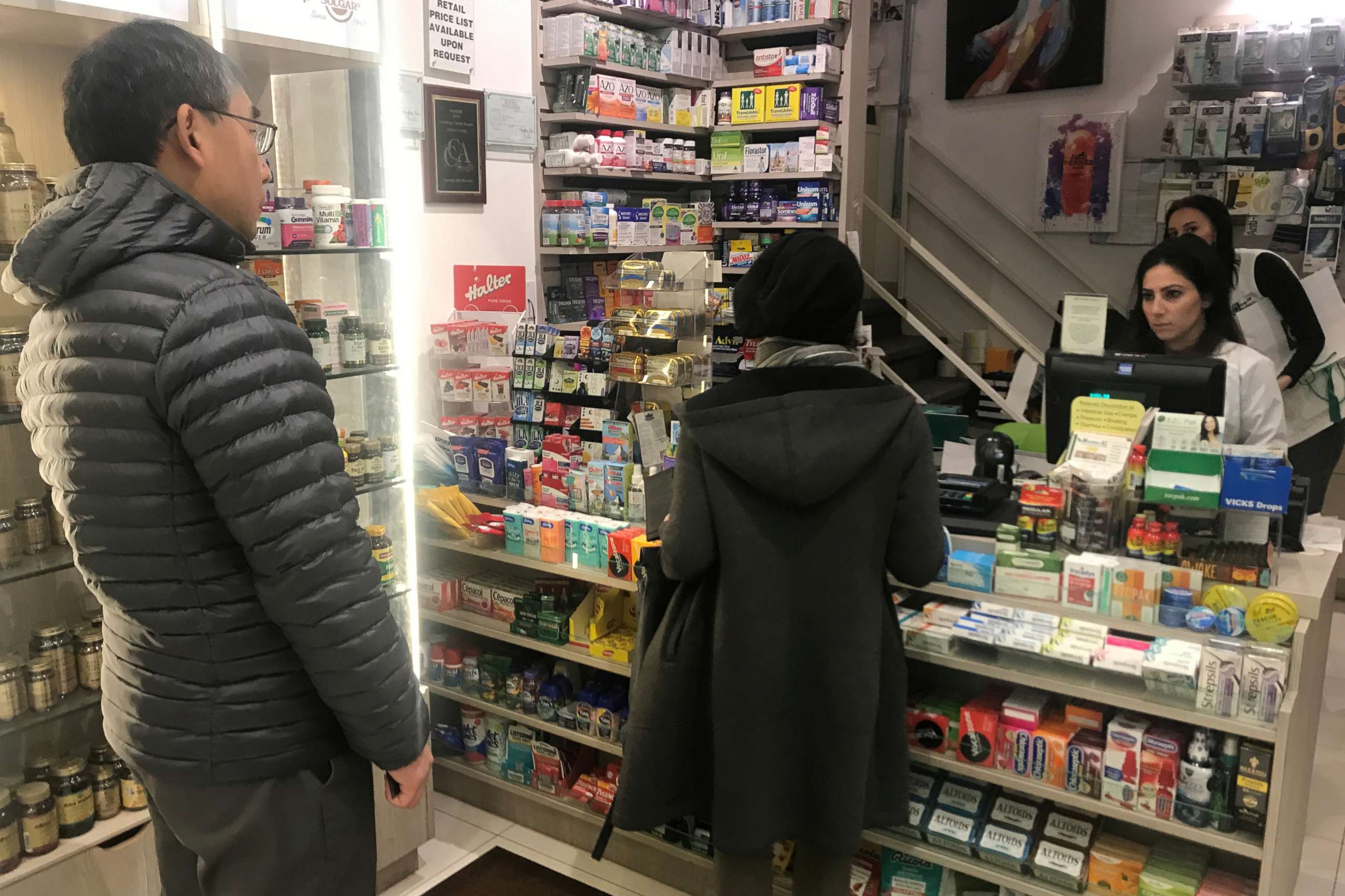 PHOTO: People line up at a pharmacy to purchase N95 face masks in advance of the potential coronavirus outbreak in the Manhattan borough of New York City, New York, Feb. 27, 2020.