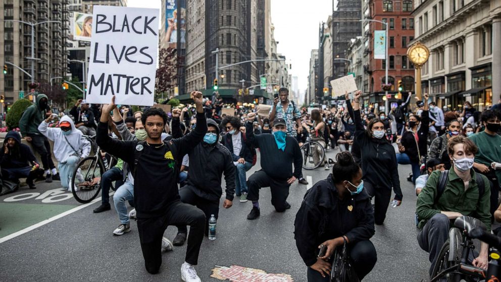 PHOTO: Protesters participate in a moment of silence during a rally against the death in Minneapolis police custody of George Floyd, in the Manhattan borough of New York City, June 1, 2020.